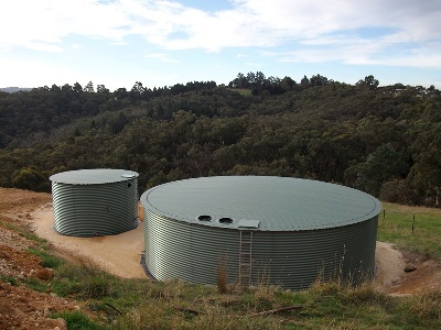 Large and small Aquamate Water Tanks in Rivergum Green